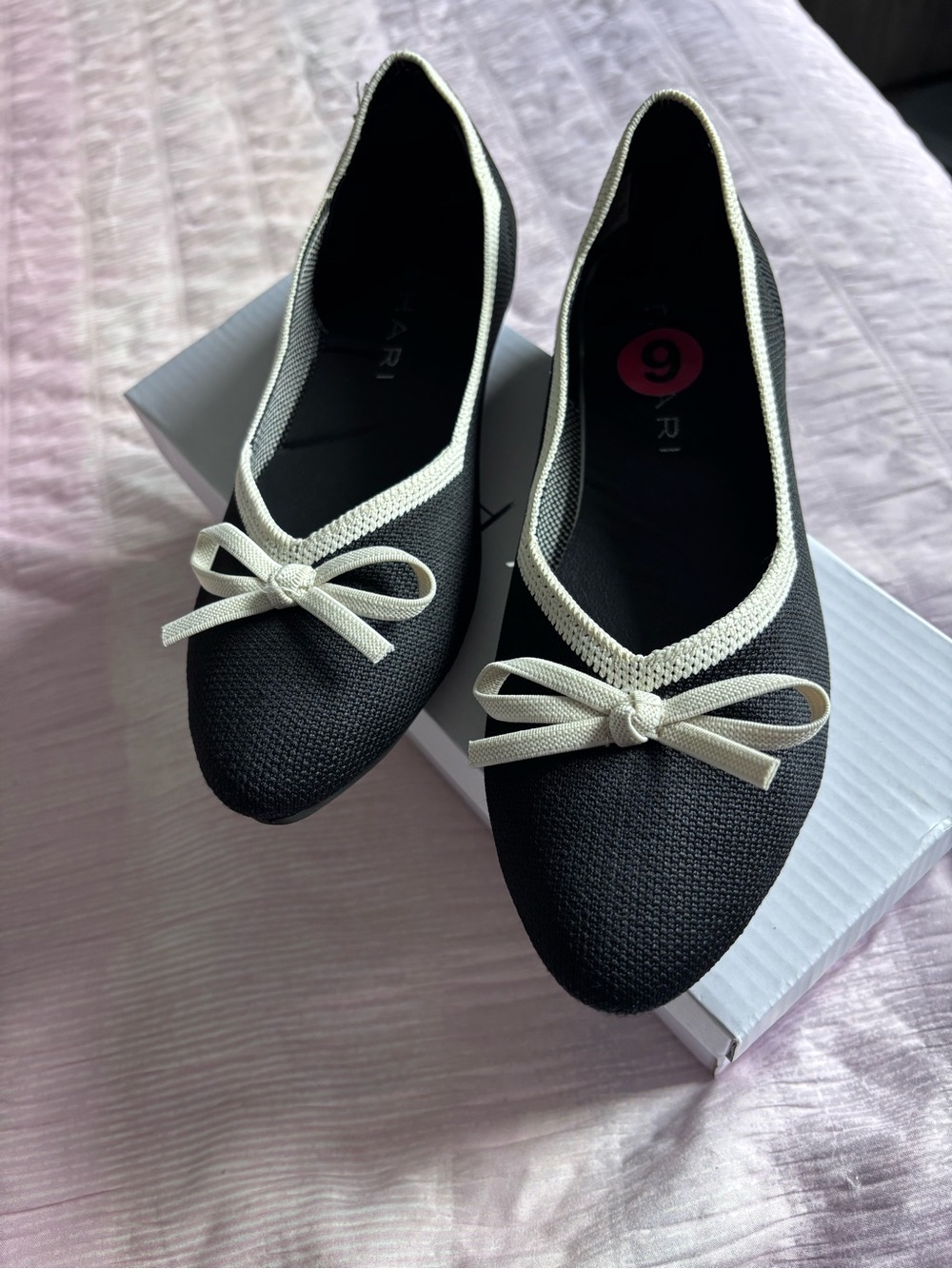 Tahari Black Flats with Cream Trim and Bow Accent